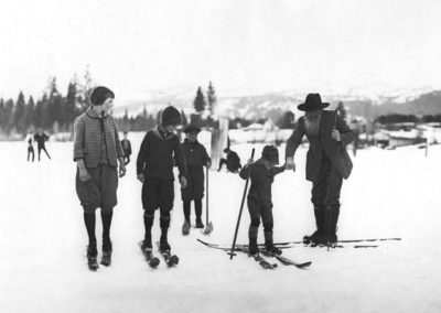 Grandpa Shaw teaching young skiers